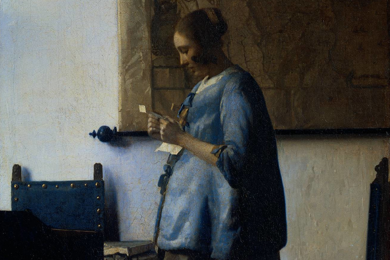 Woman in Blue Reading a Letter by Jan Vermeer